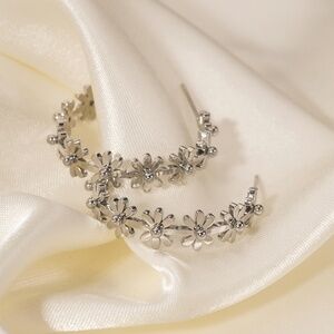 Brand new Silver surgical steel daisy flower hoop earrings